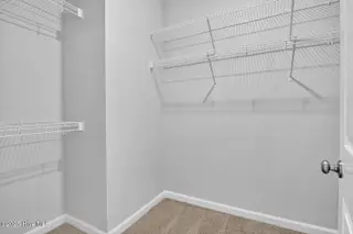 2225 Star Shower Way, Leland, NC 28451 – photo 16: Primary walk-in closet