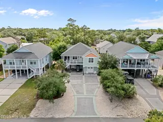 142 NW 12th Street, Oak Island, NC 28465 – photo 2: 1-web-or-mls-DJI_20250724102340_0401_D