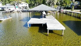 804 42 Canal Cove Road, Lake Waccamaw, NC 28450 – photo 5: dji_fly_20250325_005416_309_178905277182