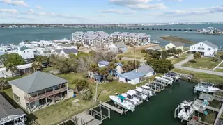 319 Old Causeway Road, Atlantic Beach, NC 28512 – photo 4: Aerial of house and boatslips