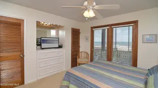 941 Ocean Boulevard W, Holden Beach, NC 28462 – photo 12: Main Level Bedroom
