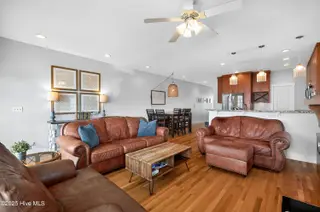 1106 Fort Fisher Boulevard N Unit 1, Kure Beach, NC 28449 – photo 23: 21 - Living Room