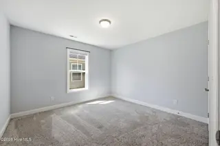 106 Heckathorne Drive, New Bern, NC 28560 — 3-bedroom home in West Crossroads, New Bern, NC, photo 20 of 33: Guest Room 2