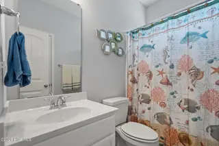106 NW 19th Street, Oak Island, NC 28465 – photo 19: 16-web-or-mls-DSC01419