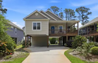 332 NE 52nd Street, Oak Island, NC 28465 – photo 1: 332_NE_52nd_St_001