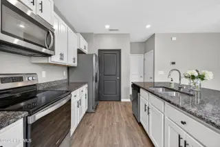 825 Seathwaite Lane SE, Leland, NC 28451 – photo 14: 825SeathwaiteLaneSE-15 Kitchen garage vi