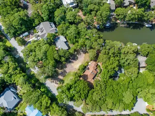 117 White Ash Drive, Pine Knoll Shores, NC 28512 – photo 18: Enjoy the privacy of the canal