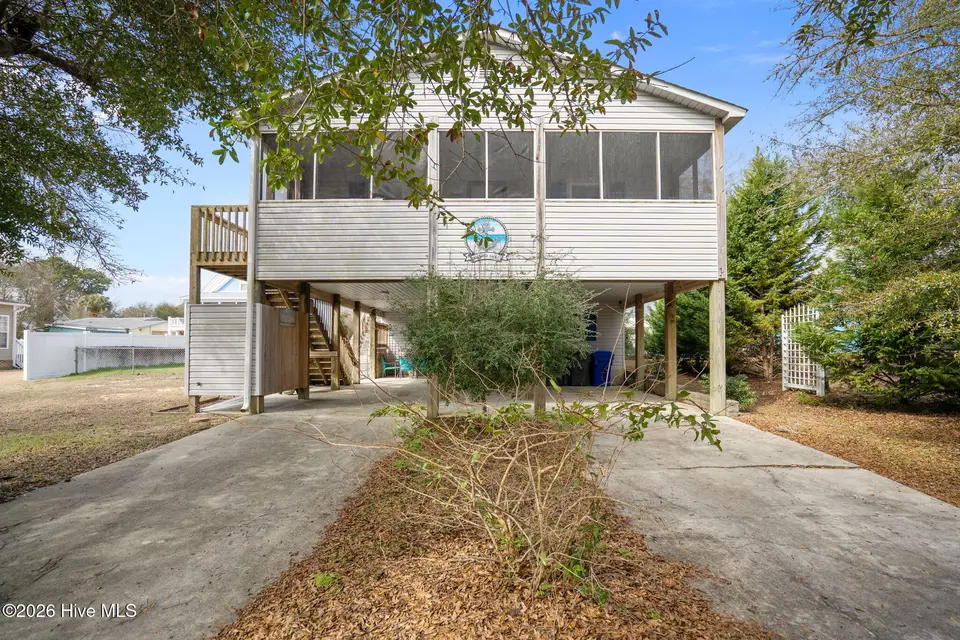 321 NE 59th Street, Oak Island, NC 28465 – photo 1 of 61: 1-web-or-mls-DSC05940