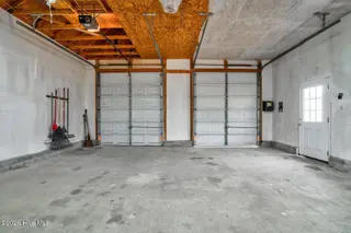 6574 Leigh Road, Rocky Mount, NC 27803 — 3-bedroom home in Williams Farm, Rocky Mount, NC, photo 7 of 30: Detached Garage Interior