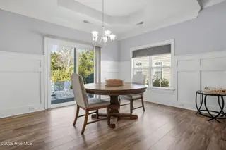 6476 Bryson Drive SW, Ocean Isle Beach, NC 28469 – photo 17: Sliders to covered grilling area