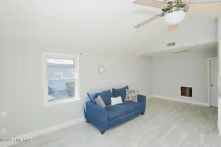 127 NW 10th Street, Oak Island, NC 28465 – photo 11: 127 NW 10th St Oak Island NC-large-014-0
