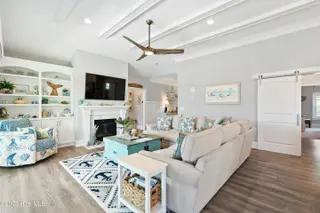 1353 Dunes Boulevard SW, Ocean Isle Beach, NC 28469 – photo 12: Barn door to guest wing