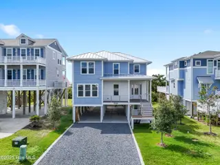 5515 E Pelican Drive, Oak Island, NC 28465 – photo 2: 5515EPelicanDr - 3 (1)