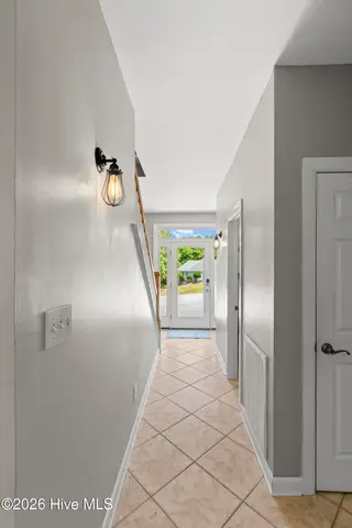 9804 Heath Place, Emerald Isle, NC 28594 – photo 21: Hallway looking at front door