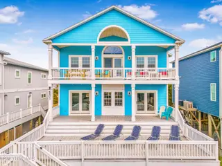 6901 Kings Lynn Drive, Oak Island, NC 28465 – photo 2: DJI_20250401104420_0008_D-Edit