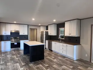 486 Scuppernong Circle SE, Bolivia, NC 28422 — 4-bedroom manufactured home in Vineyard Landing, Bolivia, NC, photo 2 of 4: Kitchen
