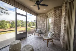 5307 Marco Drive SE, Southport, NC 28461 — 3-bedroom home in The Home Place of Southport, Southport, NC, photo 24 of 56: 23- Lanai