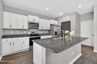 825 Seathwaite Lane SE, Leland, NC 28451 – photo 16: 825SeathwaiteLaneSE-14 Kitchen side view