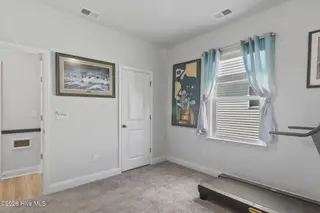 9410 Barnstormer Drive NW, Calabash, NC 28467 — 3-bedroom home in Eagle Run, Calabash, NC, photo 17 of 47: Bedroom 1