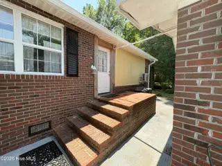 144 Waccamaw Shores Road, Lake Waccamaw, NC 28450 – photo 15: Side entrance