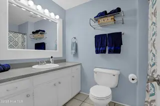 767 E Ocean Road, Holly Ridge, NC 28445 — 3-bedroom home, Holly Ridge, NC, photo 20 of 39: Hall Bathroom