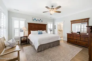 202 NE 64th Street, Oak Island, NC 28465 – photo 20: Primary bedroom