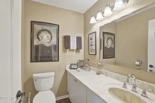105 Laurel Court, Pine Knoll Shores, NC 28512 – photo 15: Downstairs 1/2 bath