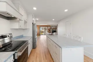 413 Club Colony Drive, Atlantic Beach, NC 28512 – photo 11: Kitchen with quartz countertops