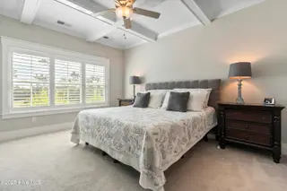 6475 Bryson Drive SW, Ocean Isle Beach, NC 28469 – photo 20: 1st level primary suite