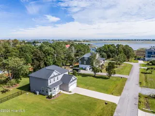 235 Topsail Watch Drive, Hampstead, NC 28443 — 3-bedroom home in Topsail Watch, Hampstead, NC, photo 1 of 58: 1-web-or-mls-DJI_20260925150430_0066_D