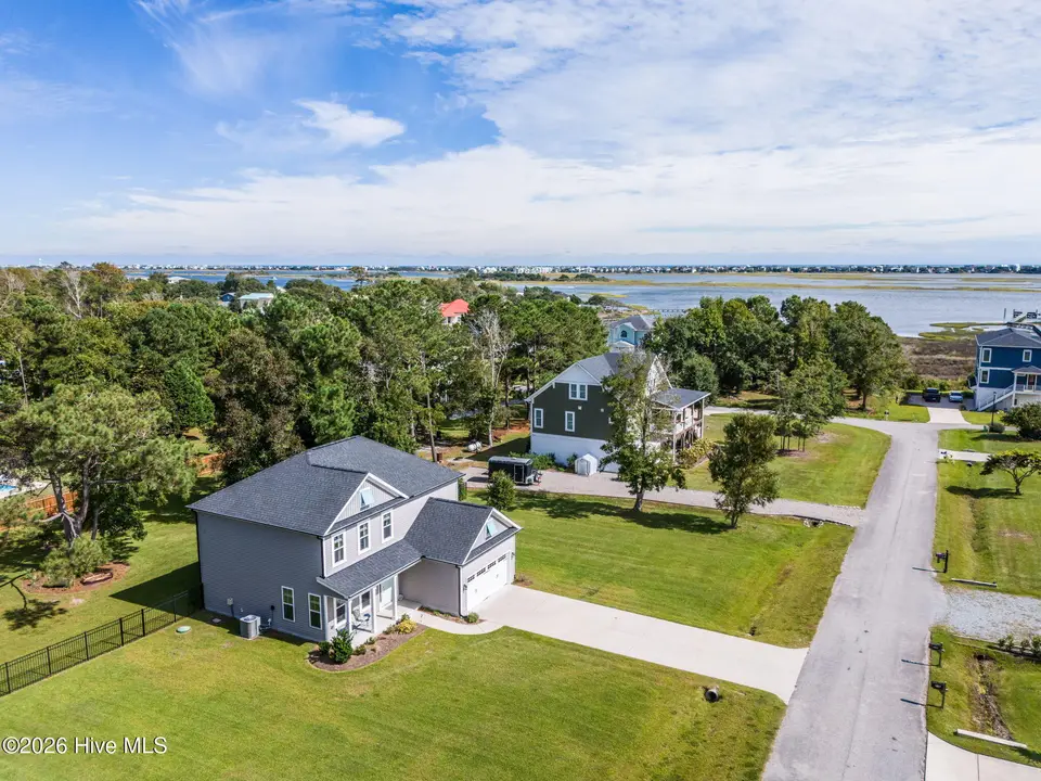 235 Topsail Watch Drive, Hampstead, NC 28443 — 3-bedroom home in Topsail Watch, Hampstead, NC, photo 1 of 58: 1-web-or-mls-DJI_20260925150430_0066_D
