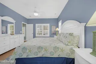 409 Womble Street, Oak Island, NC 28465 – photo 21: Primary Bedroom