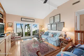 590 Westport Drive H1 Westport, Pine Knoll Shores, NC 28512 – photo 7: Living room with sound views
