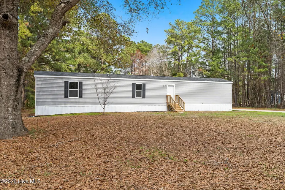 1396 Stanley Road SW, Supply, NC 28462 — 3-bedroom manufactured home in Kenson Acres, Supply, NC, photo 1 of 27: 2-web-or-mls-cammediallc.com-22