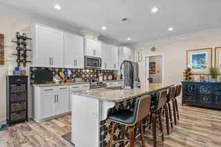 108 NE 17th Street, Oak Island, NC 28465 – photo 16: 36-web-or-mls-DSC07408