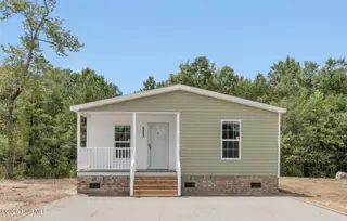 6801 Lewis Drive SE, Winnabow, NC 28479 – photo 1: 6801 Lewis Dr