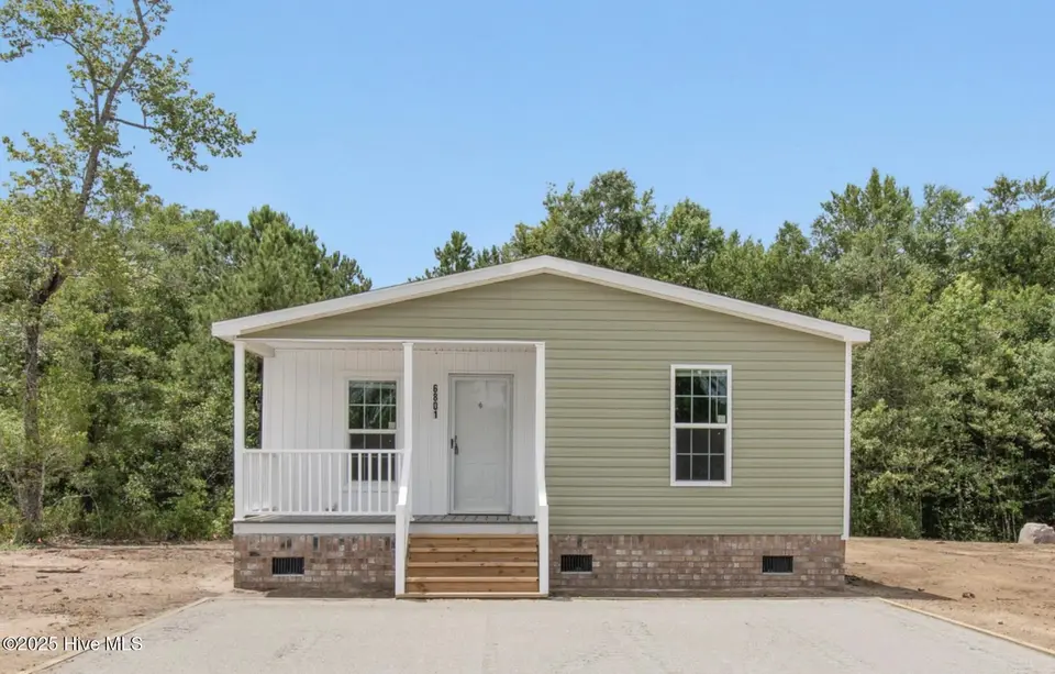 6801 Lewis Drive SE, Winnabow, NC 28479 – photo 1 of 21: 6801 Lewis Dr