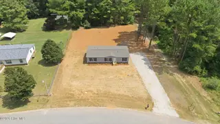 9757 Fire Tower Farm Road, Whitakers, NC 27891 – photo 13: 14-web-or-mls-DJI_20260820132337_0554_D