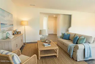 273 Ocean Pointe Boulevard SE 1801, Bolivia, NC 28422 – photo 5: AI-LIVINGROOM