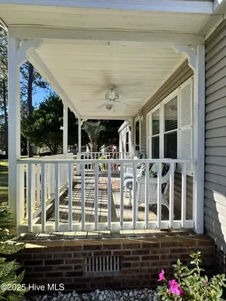 211 Beachwood Drive NW, Calabash, NC 28467 — 3-bedroom manufactured home in Ocean Forest, Calabash, NC, photo 12 of 75: porch 4