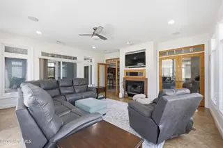 105 Pailin Creek Road, Elizabeth City, NC 27909 — 3-bedroom home in Pailin Creek Landing, Elizabeth City, NC, photo 14 of 56: Den