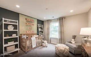 562 Glitter Bay Loop, Shallotte, NC 28470 — 4-bedroom home in Solserra, Shallotte, NC, photo 8 of 42: Secondary Bedroom