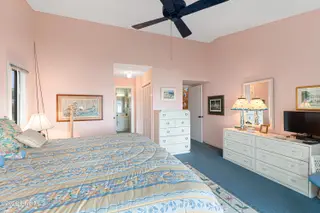 590 Westport Drive H1 Westport, Pine Knoll Shores, NC 28512 – photo 23: Primary suite with sound views