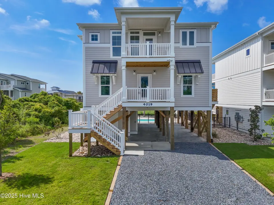 4019 E Pelican Drive, Oak Island, NC 28465 – photo 1 of 70: 4019EPelicanDr - 1