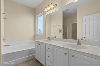 12 Calabash Lakes Boulevard, Carolina Shores, NC 28467 – photo 18: Owners Suite Bathroom
