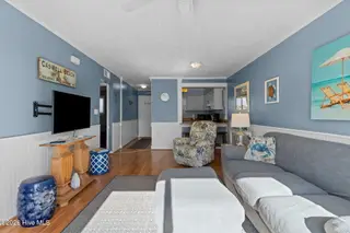 1000 Caswell Beach Road Apt. 806, Oak Island, NC 28465 — 2-bedroom condo in Oak Island Bch Villa, Oak Island, NC, photo 22 of 56: Combined Dining and Living Area