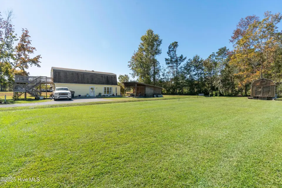 198 Jefferson Road, Lake Waccamaw, NC 28450 – photo 1 of 27: mls-DSC07072