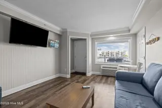 The Islander Suites, Emerald Isle — 1-bedroom condo in The Islander Suites, Emerald Isle, NC, photo 4 of 23: Living Room