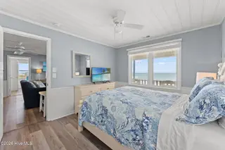 392 E First Street, Ocean Isle Beach, NC 28469 – photo 24: Right side primary bedroom