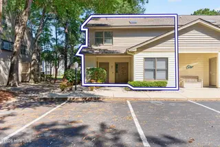 222 SW Clubhouse Road # A, Sunset Beach, NC 28468 — 3-bedroom townhome in Sea Trail Plantation, Sunset Beach, NC, photo 1 of 59: FRONT ELEVATION